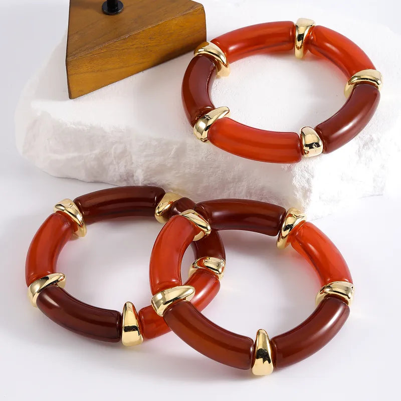 Two resin necklaces & three bracelets