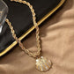 Gold seashell necklace