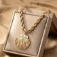 Gold seashell necklace