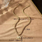 Gold seashell necklace