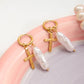 Gold cross earrings