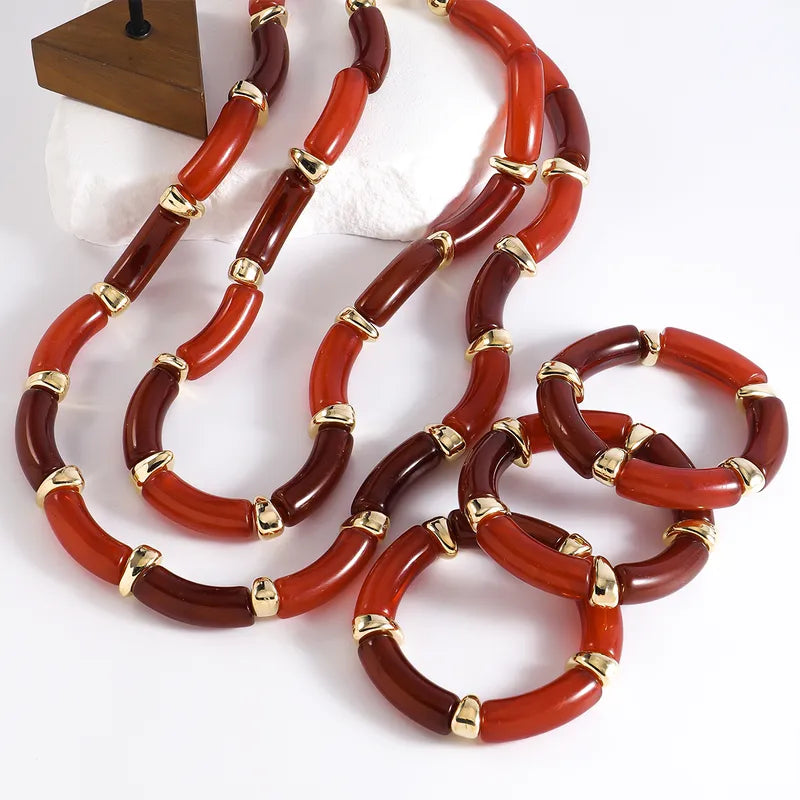 Two resin necklaces & three bracelets