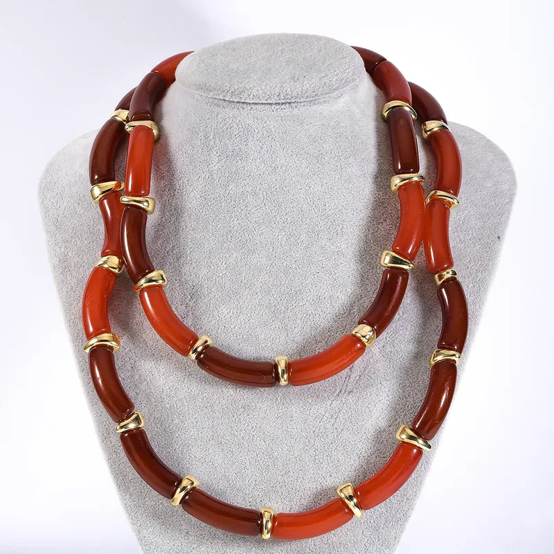 Two resin necklaces & three bracelets