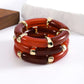Two resin necklaces & three bracelets